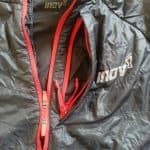 Dettaglio della cerniera e della tasca della giacca Inov-8 ATC Thermoshell HZM